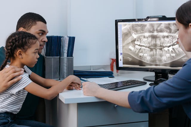 Dentist reviews x-rays